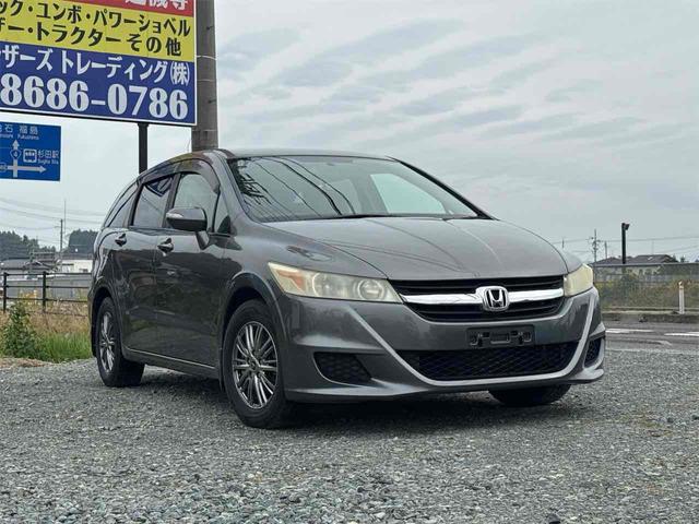 ストリーム Ｘ　ＨＤＤナビパッケージ　ＥＴＣ　バックカメラ　ナビ　オートライト　ＨＩＤ　キーレスエントリー　電動格納ミラー　３列シート　ＡＴ　アルミホイール　ＡＢＳ　エアコン　パワーステアリング（12枚目）