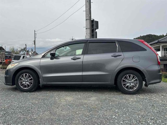 ストリーム Ｘ　ＨＤＤナビパッケージ　ＥＴＣ　バックカメラ　ナビ　オートライト　ＨＩＤ　キーレスエントリー　電動格納ミラー　３列シート　ＡＴ　アルミホイール　ＡＢＳ　エアコン　パワーステアリング（17枚目）