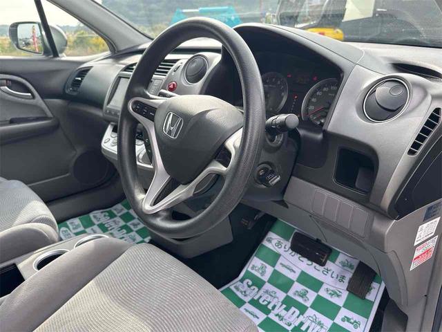 ストリーム Ｘ　ＨＤＤナビパッケージ　ＥＴＣ　バックカメラ　ナビ　オートライト　ＨＩＤ　キーレスエントリー　電動格納ミラー　３列シート　ＡＴ　アルミホイール　ＡＢＳ　エアコン　パワーステアリング（36枚目）