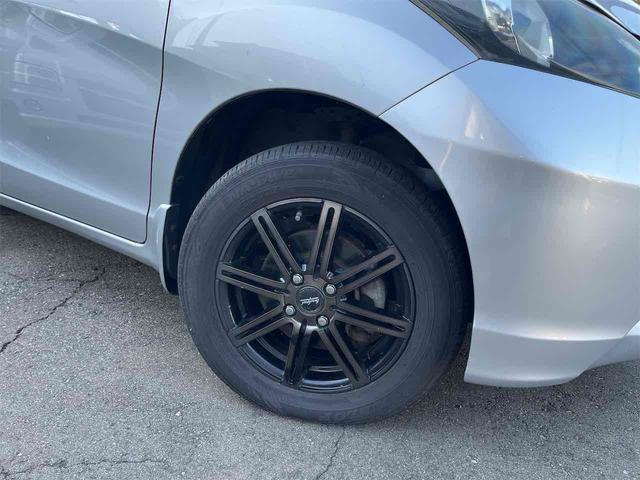 フリード G 4WD ETC バックカメラ 両側スライド・片側電動 キーレスエントリー 電動格納ミラー 3列シート ウォークスルー AT アルミホイール 衝突安全ボディ ABS エアコン パワーステアリング(20枚目)