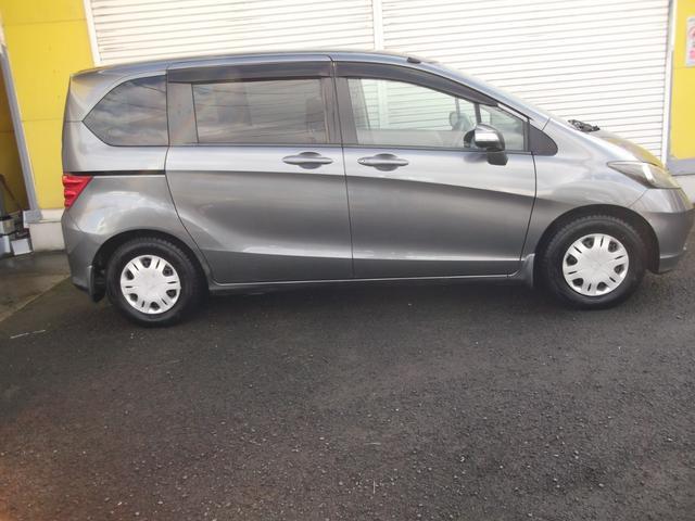 フリード フレックス Fパッケージ ナビ・テレビ ETC エンジンスターター スタッドレス付 左側パワースライドドア アルミホイール 5人乗り ABS エアバック(3枚目)