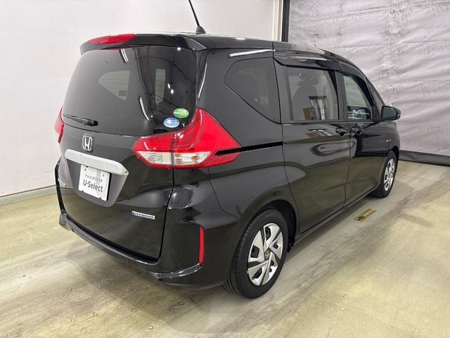 フリードハイブリッド ハイブリッド・Ｇホンダセンシング　純正インターナビ　フルセグ　ＣＤ　ＤＶＤ　Ｂｌｕｅｔｏｏｔｈ　バックカメラ　ホンダセンシング　ＥＴＣ　両側電動スライドドア　シートヒーター　ドライブレコーダー　ＬＥＤヘットライト　ＶＳＡ（横滑り防止）（5枚目）