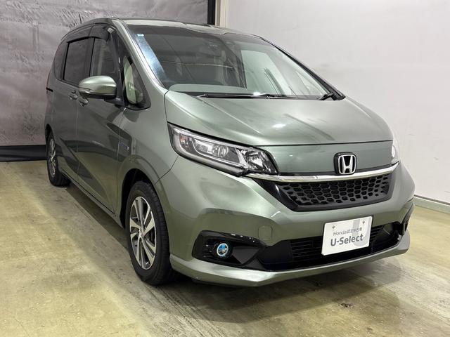 フリードハイブリッド ハイブリッド・Gホンダセンシング 純正メモリーインターナビ フルセグ 純正ドライブレコーダー ETC シートヒーター 両側電動スライドドア ホンダセンシング 純正アルミホイール LEDヘットライト(2枚目)