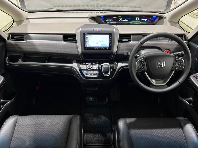 フリードハイブリッド ハイブリッド・Gホンダセンシング 純正メモリーインターナビ フルセグ 純正ドライブレコーダー ETC シートヒーター 両側電動スライドドア ホンダセンシング 純正アルミホイール LEDヘットライト(8枚目)