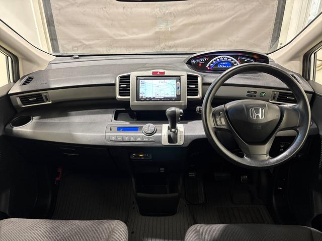 フリード Gジャストセレクション 4WD ETC 左側電動スライドドア VSA(横滑り防止) 純正メモリーインターナビ(8枚目)