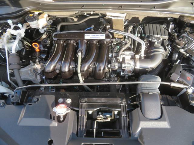 ヴェゼル X・ホンダセンシング ホンダセンシング ETC 純正リモコンエンジンスターター クルーズコントロール 社外メモリーナビ バックカメラ LEDヘットライト 純正アルミホイール LEDフォグランプ(5枚目)