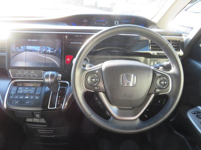 ステップワゴンスパーダ スパーダ・クールスピリットホンダセンシング　純正メモリーインターナビ　シートヒーター　両側電動スライドドア　ＥＴＣ　ホンダセンシング　クルーズコントロール　リヤ席フリップダウンモニター　ＬＥＤヘットライト　ＬＥＤフォグランプ　純正アルミホイール（6枚目）
