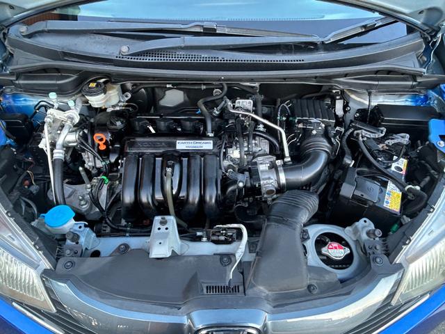 フィット １３Ｇ・Ｆパッケージ　純正リモコンエンジンスターター　純正インターメモリーナビ　ＶＳＡ（横滑り防止）　ＣＴＢＡ（衝突軽減ブレーキ）　純正ドライブレコーダー　ＥＴＣ　ＬＥＤヘットライト（5枚目）