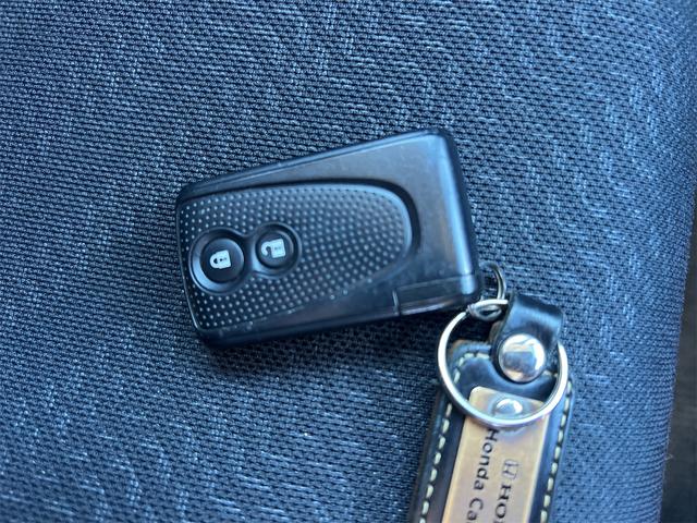 N-BOXカスタム G ターボSSパッケージ ETC バックカメラ 両側電動パワスラ Bluetooth ナビ DTV オートクルーズコントロール オートライト HID スマートキー 電格ミラー ベンチシート CVT 盗難防止システム ABS(54枚目)