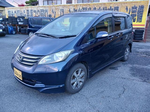 フリード Ｇ　エアロ　ＥＴＣ　ナビ　ＴＶ　両側電動スライドドア　オートライト　ＨＩＤ　スマートキー　電動格納ミラー　３列シート　ウォークスルー　ＣＶＴ　アルミホイール　ＣＤ　盗難防止システム　衝突安全ボディ　ＡＢＳ（11枚目）