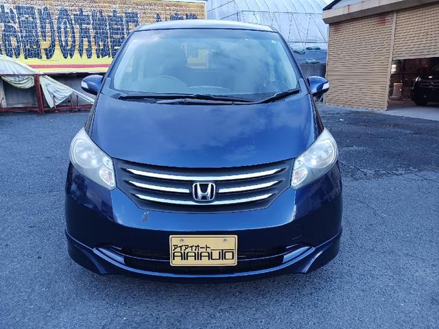 フリード Ｇ　エアロ　ＥＴＣ　ナビ　ＴＶ　両側電動スライドドア　オートライト　ＨＩＤ　スマートキー　電動格納ミラー　３列シート　ウォークスルー　ＣＶＴ　アルミホイール　ＣＤ　盗難防止システム　衝突安全ボディ　ＡＢＳ（12枚目）