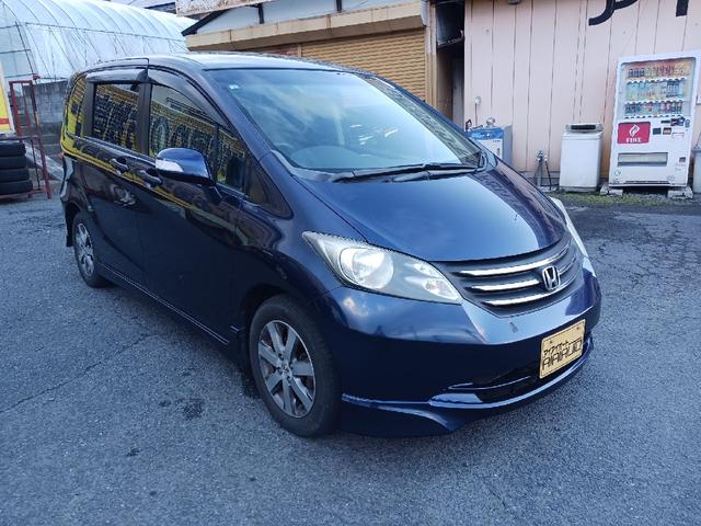 フリード Ｇ　エアロ　ＥＴＣ　ナビ　ＴＶ　両側電動スライドドア　オートライト　ＨＩＤ　スマートキー　電動格納ミラー　３列シート　ウォークスルー　ＣＶＴ　アルミホイール　ＣＤ　盗難防止システム　衝突安全ボディ　ＡＢＳ（13枚目）