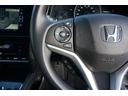 ハイブリッド　ホンダセンシング　ＬＥＤヘッドライト純正ブルートゥースナビＴＶバックカメラＥＴＣスマートキー社外１５インチアルミホイールレザー調シートカバー（9枚目）