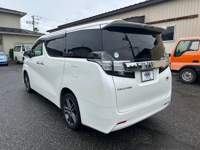 ヴェルファイアハイブリッド Ｖ　４ＷＤ　ＥＴＣ　ドライブレコーダー　キーレス　スマートキー　プッシュスタート　ナビ　ＴＶ　フリップダウンモニター　シートメモリ機能付き　両側電動スライドドア　パワーシート（7枚目）