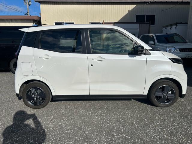 サクラ Ｘ　電気自動車　シートヒーター　ステアリングヒーター　全方位カメラ　ナビ　ＬＥＤヘッドランプ　スマートキー　キーレス　アルミホイール　クリアランスソナー（4枚目）