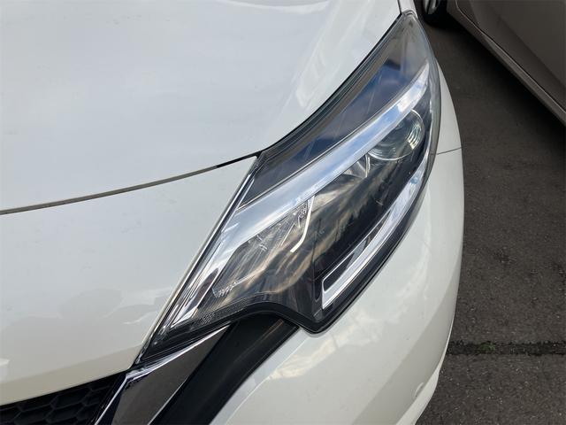 ノート Ｘ　ＦＯＵＲ　４ＷＤ　クリアランスソナー　レーンアシスト　衝突被害軽減システム　オートライト　スマートキー　電動格納ミラー　ＣＶＴ　盗難防止システム　衝突安全ボディ　記録簿　ＡＢＳ　ＥＳＣ　ＣＤ（22枚目）