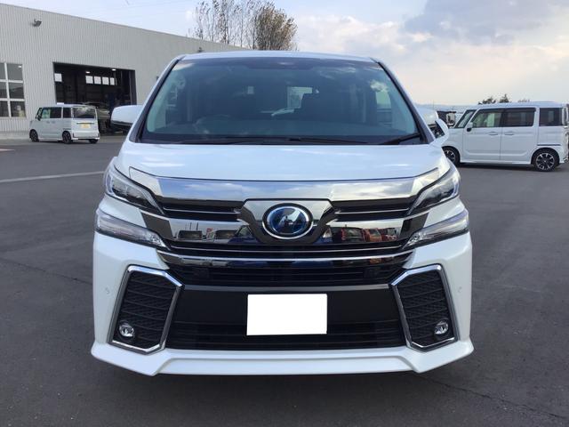 ヴェルファイアハイブリッド ZR 4WD 両自動ドア BLUETOOTH 衝突安全ボディ Wエアコン リヤカメラ クルコン 横滑り防止機能 盗難防止システム 電動シート 三列シート オットマン スマキー ナビ・TV 後席モニター(7枚目)