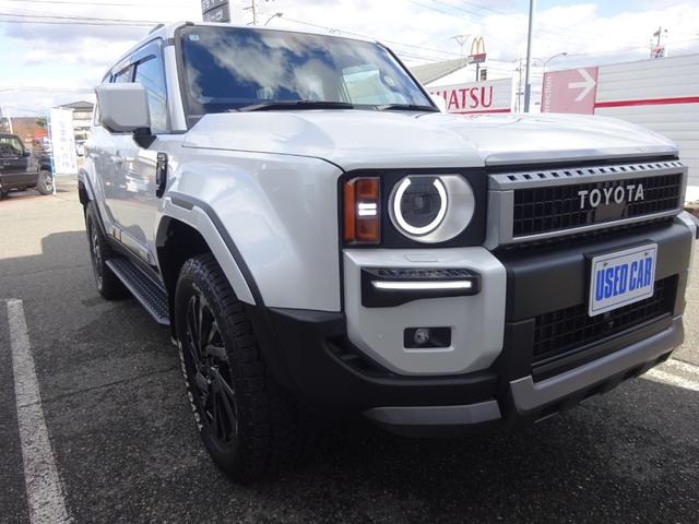 ランドクルーザー２５０ ＶＸ　４ＷＤ　１オーナー　トヨタチームメイト　デジタルキー　丸目ヘッドランプ　モデリスタプロテクターキット　オーバーフェンダー　シグネチャーイルミブレード　モデリスタ２０ｉｎアルミ＆タイヤセット（42枚目）