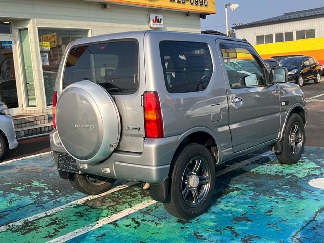 ジムニー ランドベンチャー　４ＷＤ　５速マニュアル　オプションカラー　特別仕様車　ハーフレザーシート　フルセグナビ　シートヒーター　ミラーヒーター　背面タイヤハードカバー　純正１６インチアルミホイール　クロムメッキバンパーカバー（13枚目）