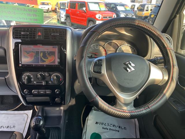 ジムニー ランドベンチャー　４ＷＤ　５速マニュアル　オプションカラー　特別仕様車　ハーフレザーシート　フルセグナビ　シートヒーター　ミラーヒーター　背面タイヤハードカバー　純正１６インチアルミホイール　クロムメッキバンパーカバー（21枚目）