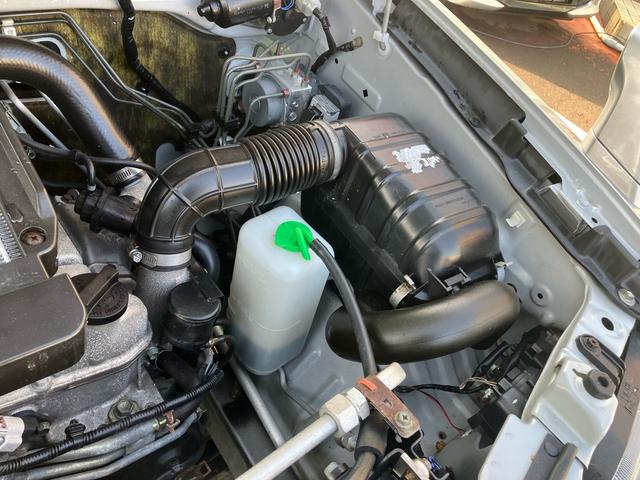 ジムニー ランドベンチャー　４ＷＤ　５速マニュアル　オプションカラー　特別仕様車　ハーフレザーシート　フルセグナビ　シートヒーター　ミラーヒーター　背面タイヤハードカバー　純正１６インチアルミホイール　クロムメッキバンパーカバー（48枚目）