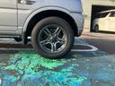 ランドベンチャー　４ＷＤ　５速マニュアル　オプションカラー　特別仕様車　ハーフレザーシート　フルセグナビ　シートヒーター　ミラーヒーター　背面タイヤハードカバー　純正１６インチアルミホイール　クロムメッキバンパーカバー（56枚目）