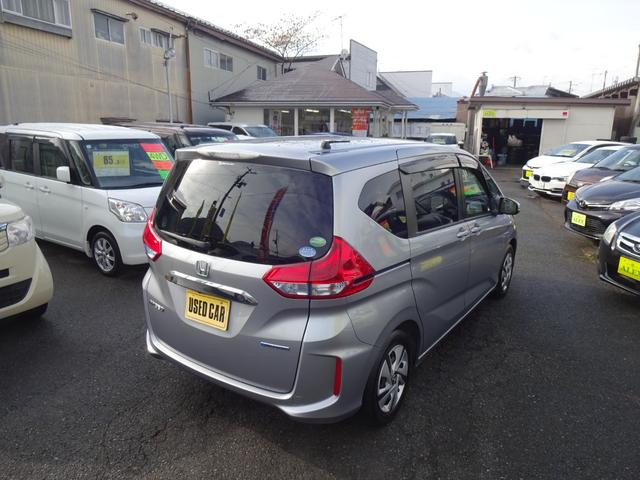 フリードハイブリッド ハイブリッド・Ｇホンダセンシング　Ｇａｔｈｅｒｓナビ／フルセグテレビ／バックモニター／両側電動スライドドア／ホンダセンシング／衝突軽減ブレーキ／横滑り防止／ＬＥＤヘッドライト／アクティブコーナーライト／ハイブリッド車／ＥＴＣ（3枚目）