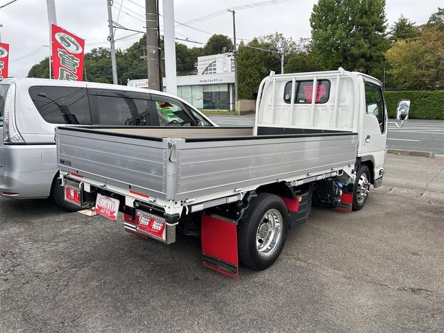 エルフトラック カスタム　４ＷＤ　トラック　５ＭＴ　レーンアシスト　ＥＴＣ　ナビ　バックカメラ　スマートキー　アイドリングストップ　電動格納ミラー　アルミホイール　ＡＢＳ　ＥＳＣ　エアコン　パワーウィンドウ　運転席エアバッグ（16枚目）