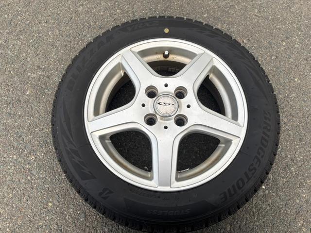 アルトラパン Ｘ　スマートアシスト　シートヒーター　ＥＴＣ　スマートキー　ＨＩＤヘッドライト　横滑り防止装置　アイドリングストップ　純正ＣＤオーディオ　純正１４インチアルミホイール　オートライト　オートエアコン（54枚目）