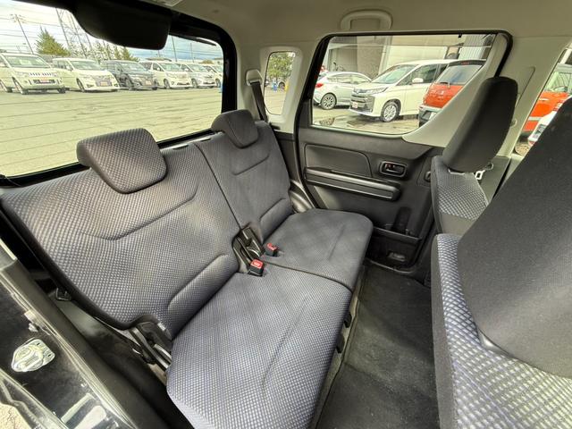 ワゴンＲ ハイブリッドＦＸ　４ＷＤ　ケンウッド製メモリーナビ　バックカメラ　シートヒーター　オートエアコン　ＨＩＤヘッド　アイドリングストップ　盗難防止装置　横滑り防止装置　電動格納ミラー　ベンチシート　純正１４インチアルミ（10枚目）