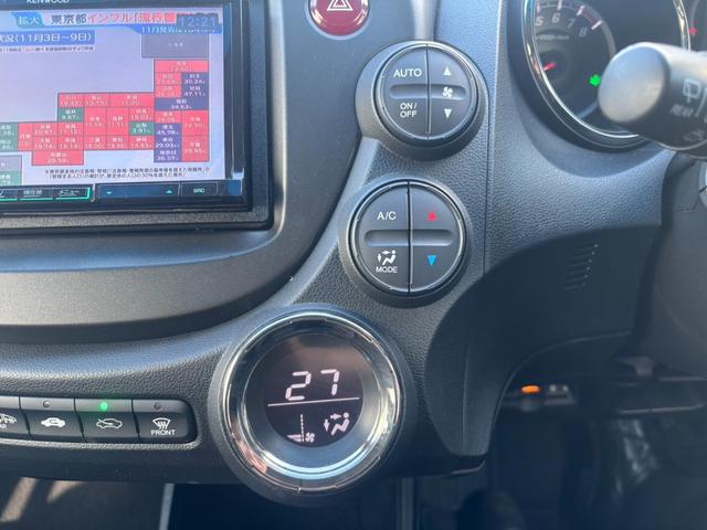 フィット １５ＸＨ　ファインスタイル　４ＷＤ　ケンウッド製ナビ　ブラウン合皮シート　シートヒーター　スマートキー　クルーズコントロール　純正革巻きステアリング　ＨＩＤヘッド　オートライト　オートエアコン　純正１５インチアルミ　盗難防止装置（31枚目）