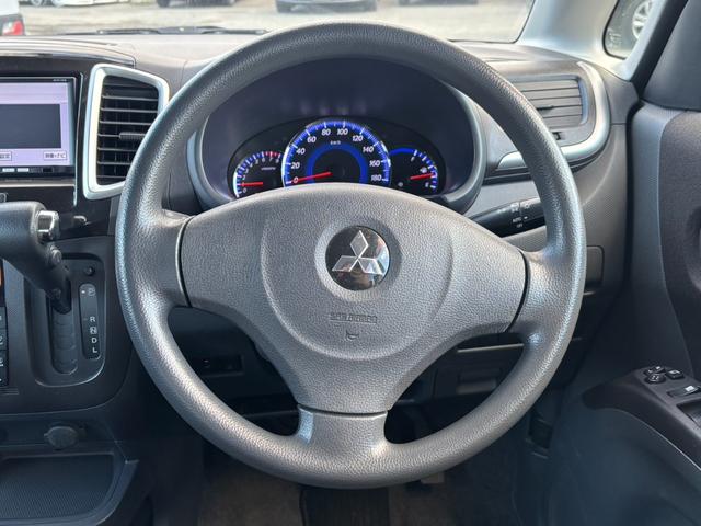 デリカＤ：２ Ｘ　片側パワースライドドア　エクリプス製メモリーナビ　バックカメラ　シートヒーター　スマートキー　プライバシーガラス　オートエアコン　リアヒーターダクト　ヒーテッドドアミラー　純正１４インチアルミ（11枚目）