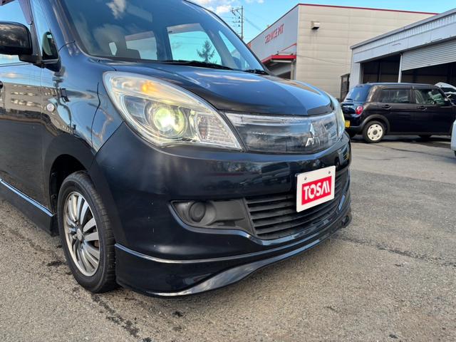 デリカＤ：２ Ｘ　片側パワースライドドア　エクリプス製メモリーナビ　バックカメラ　シートヒーター　スマートキー　プライバシーガラス　オートエアコン　リアヒーターダクト　ヒーテッドドアミラー　純正１４インチアルミ（41枚目）