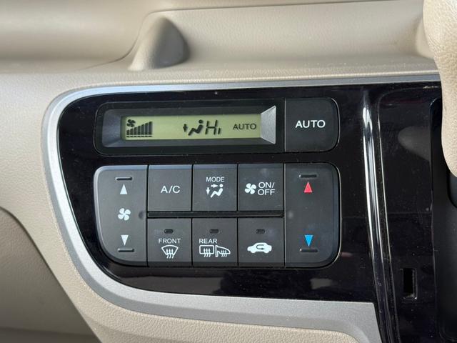N-BOX G・Lパッケージ 4WD 片側パワースライドドア スマートキー Clarion製CDオーディオ オートエアコン ステアリングスイッチ オートエアコン キーレス バニティミラー 電動格納ミラー 社外エンジンスターター(6枚目)
