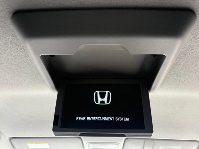 ステップワゴンスパーダ Ｚ　インターナビセレクション　フリップダウンモニター　両側電動スライドドア　寒冷地仕様　純正ＨＤＤナビ　バックカメラ　ＥＴＣ　クルーズコントロール　ＨＩＤヘッドライト　スマートキー　フルセグＴＶ　ＣＤ／ＤＶＤ　ステアリングスイッチ（3枚目）