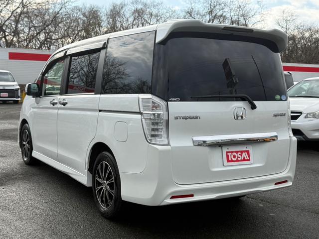 ステップワゴンスパーダ Ｚ　インターナビセレクション　フリップダウンモニター　両側電動スライドドア　寒冷地仕様　純正ＨＤＤナビ　バックカメラ　ＥＴＣ　クルーズコントロール　ＨＩＤヘッドライト　スマートキー　フルセグＴＶ　ＣＤ／ＤＶＤ　ステアリングスイッチ（19枚目）