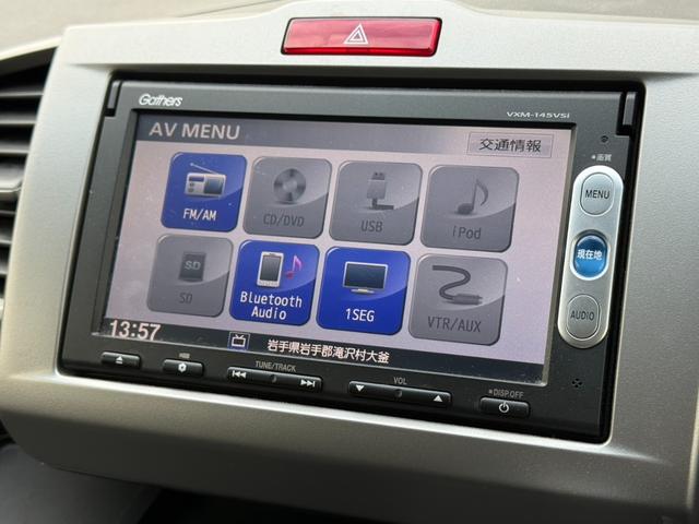 フリード Ｇ　ジャストセレクション＋　４ＷＤ　両側電動スライドドア　純正メモリーナビ　バックカメラ　合皮レザーシート　ＨＩＤヘッド　オートライト　１５インチアルミ　オートエアコン　ステアリングスイッチ　ＥＴＣ　コンフォートビューパッケージ（5枚目）