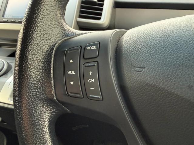 フリード Ｇ　ジャストセレクション＋　４ＷＤ　両側電動スライドドア　純正メモリーナビ　バックカメラ　合皮レザーシート　ＨＩＤヘッド　オートライト　１５インチアルミ　オートエアコン　ステアリングスイッチ　ＥＴＣ　コンフォートビューパッケージ（9枚目）