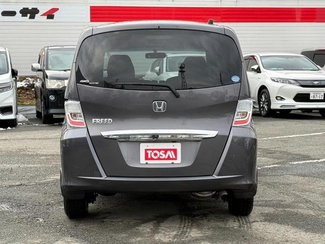 フリード Ｇ　ジャストセレクション＋　４ＷＤ　両側電動スライドドア　純正メモリーナビ　バックカメラ　合皮レザーシート　ＨＩＤヘッド　オートライト　１５インチアルミ　オートエアコン　ステアリングスイッチ　ＥＴＣ　コンフォートビューパッケージ（18枚目）