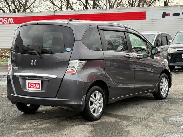 フリード Ｇ　ジャストセレクション＋　４ＷＤ　両側電動スライドドア　純正メモリーナビ　バックカメラ　合皮レザーシート　ＨＩＤヘッド　オートライト　１５インチアルミ　オートエアコン　ステアリングスイッチ　ＥＴＣ　コンフォートビューパッケージ（20枚目）