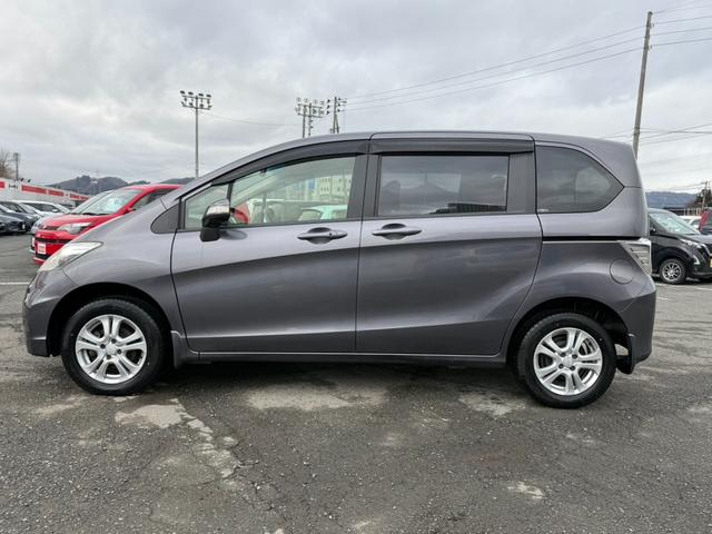 フリード Ｇ　ジャストセレクション＋　４ＷＤ　両側電動スライドドア　純正メモリーナビ　バックカメラ　合皮レザーシート　ＨＩＤヘッド　オートライト　１５インチアルミ　オートエアコン　ステアリングスイッチ　ＥＴＣ　コンフォートビューパッケージ（23枚目）