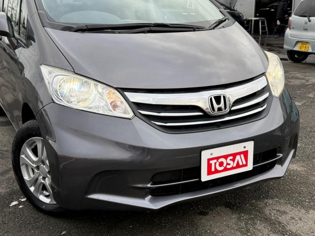 フリード Ｇ　ジャストセレクション＋　４ＷＤ　両側電動スライドドア　純正メモリーナビ　バックカメラ　合皮レザーシート　ＨＩＤヘッド　オートライト　１５インチアルミ　オートエアコン　ステアリングスイッチ　ＥＴＣ　コンフォートビューパッケージ（26枚目）