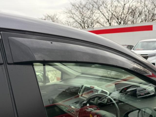 フリード Ｇ　ジャストセレクション＋　４ＷＤ　両側電動スライドドア　純正メモリーナビ　バックカメラ　合皮レザーシート　ＨＩＤヘッド　オートライト　１５インチアルミ　オートエアコン　ステアリングスイッチ　ＥＴＣ　コンフォートビューパッケージ（27枚目）