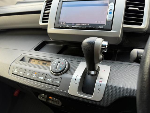 フリード Ｇ　ジャストセレクション＋　４ＷＤ　両側電動スライドドア　純正メモリーナビ　バックカメラ　合皮レザーシート　ＨＩＤヘッド　オートライト　１５インチアルミ　オートエアコン　ステアリングスイッチ　ＥＴＣ　コンフォートビューパッケージ（30枚目）