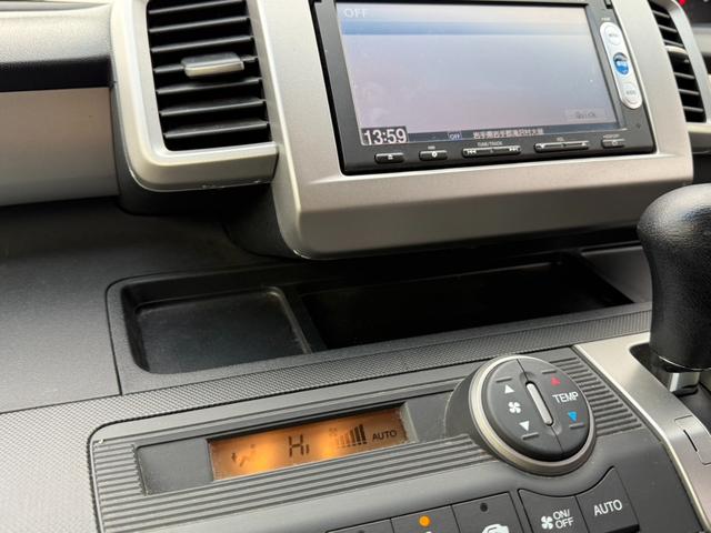 フリード Ｇ　ジャストセレクション＋　４ＷＤ　両側電動スライドドア　純正メモリーナビ　バックカメラ　合皮レザーシート　ＨＩＤヘッド　オートライト　１５インチアルミ　オートエアコン　ステアリングスイッチ　ＥＴＣ　コンフォートビューパッケージ（53枚目）