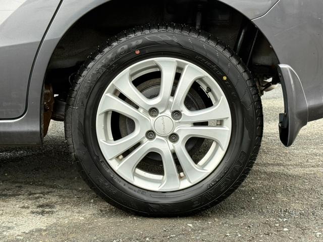 フリード Ｇ　ジャストセレクション＋　４ＷＤ　両側電動スライドドア　純正メモリーナビ　バックカメラ　合皮レザーシート　ＨＩＤヘッド　オートライト　１５インチアルミ　オートエアコン　ステアリングスイッチ　ＥＴＣ　コンフォートビューパッケージ（61枚目）