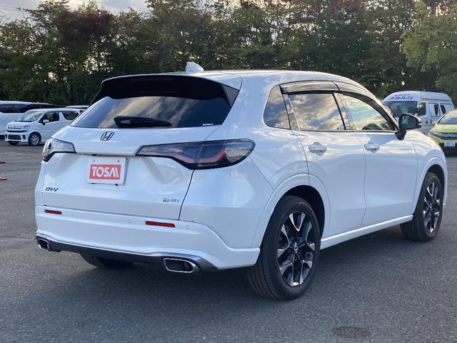 ZR-V e:HEV Z 4WD ワンオーナー 禁煙車 メモリーナビ Bluetooth 電動リアゲート 衝突被害軽減システム フルセグ ETC LEDヘッドランプ 盗難防止装置 電動シート シートヒーター オートライト(2枚目)