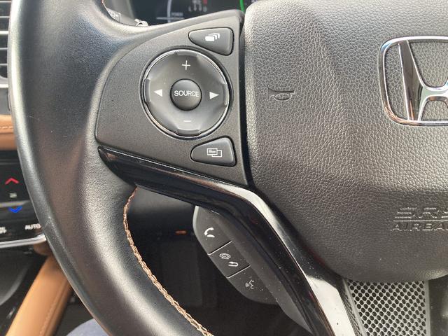 ヴェゼル ハイブリッドＺ・ホンダセンシング　メモリーナビ　ＤＶＤ再生　Ｂｌｕｅｔｏｏｔｈ　衝突被害軽減システム　フルセグ　バックカメラ　ＥＴＣ　ＬＥＤヘッドランプ　スマートキー　キーレス　盗難防止装置　シートヒーター　４ＷＤ　オートライト（9枚目）