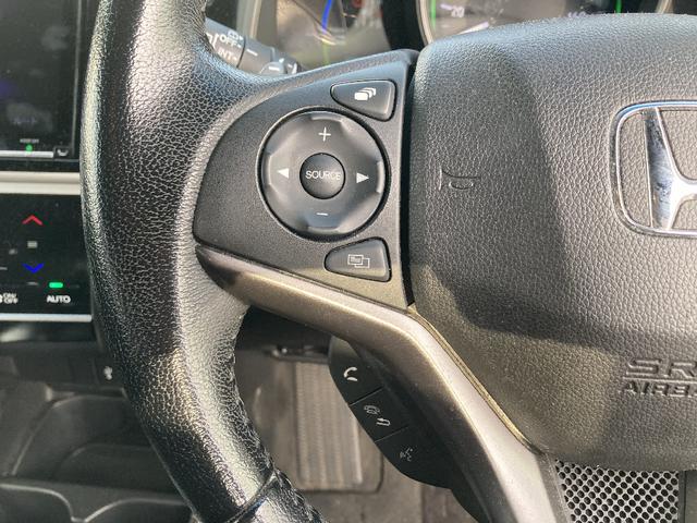 フィットハイブリッド Ｓ　ホンダセンシング　４ＷＤ　ワンオーナー　メモリーナビ　ＤＶＤ再生　フルセグ　バックカメラ　ＬＥＤヘッドランプ　スマートキー　キーレス　オートクルーズコントロール　盗難防止装置　アイドリングストップ　フルエアロ（13枚目）