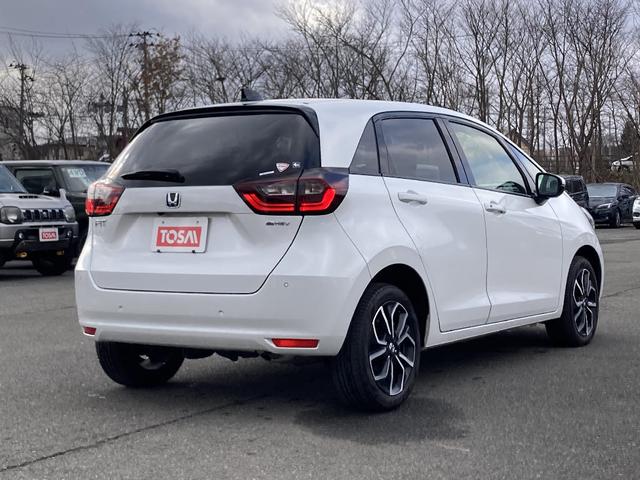 フィット e:HEVホーム 4WD 社外メモリーナビ Bluetooth 衝突被害軽減システム バックカメラ ETC LEDヘッドランプ スマートキー キーレス クリアランスソナー/バックソナー レーンアシスト 盗難防止装置(2枚目)